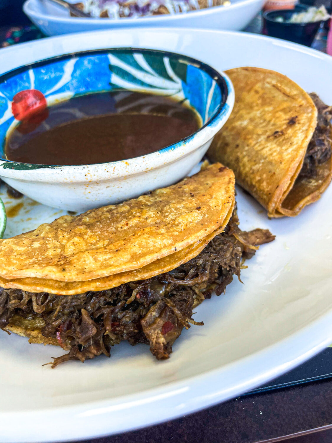 Birria tacos with consommé